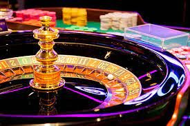 Casino slots and live table games interface shown on mobile device